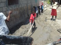 Children cleaning the school
