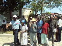 Micah leading these elderly to the distribution point