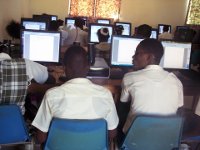 Students learning computer skills
