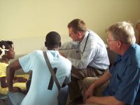 Dr. M. Lockwood and his Translators Elie (L) and Jonathan (R) at Work