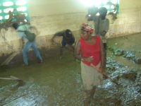 Sister Tanie helping clean the church