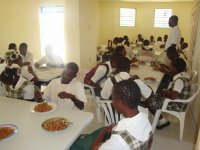 Another group of highschooler eating at the cafeteria