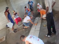 White Oak team laying tiles