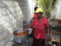 Ladies preparing sauce