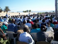 The crowd listening to the preaching