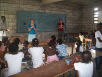 Mellinda (middle) Junior (left) and Seth (right) teaching English