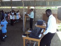 Samuel playing keyboard during Junior worship