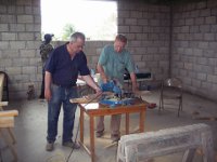 Gary and Don working on Shelving the Library