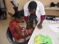 Dr. Daniel Serving Baby and Mom