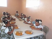 First Grade Girls Eating at the Cafeteria