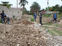 Men Working on our Private Road at the Church Campus