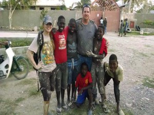 Kylee (left) and Ashley (Right) Posing for Picture with their Helpers in Painting 